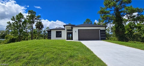 Photo of 524 Aspen Avenue S, Lehigh Acres, FL 33974 (MLS # 2026037903)