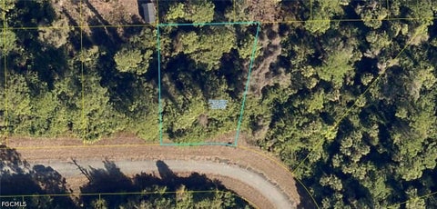 Photo of 715 Eugene Cernan Drive, Labelle, FL 33935 (MLS # 2026039231)