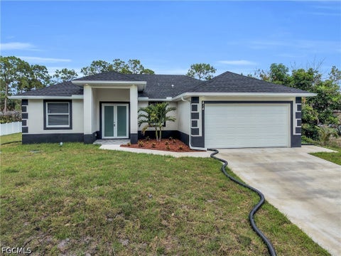 Photo of 1102 Cortez Avenue, Lehigh Acres, FL 33972 (MLS # 2026038234)