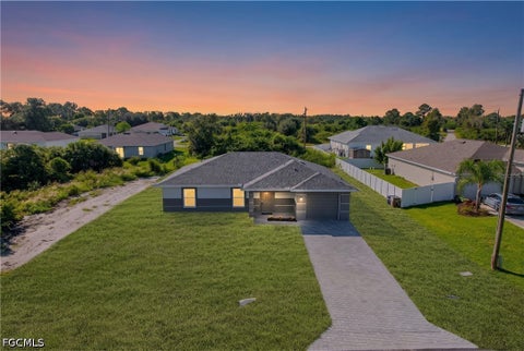 Photo of 180 Peerless Street, Lehigh Acres, FL 33974 (MLS # 2026039155)