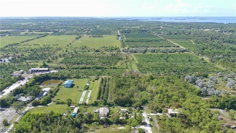 Tiny photo for 14999 Martinique Way, Bokeelia, FL 33922 (MLS # 2026039230)