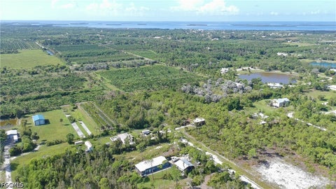 Tiny photo for 14999 Martinique Way, Bokeelia, FL 33922 (MLS # 2026039230)