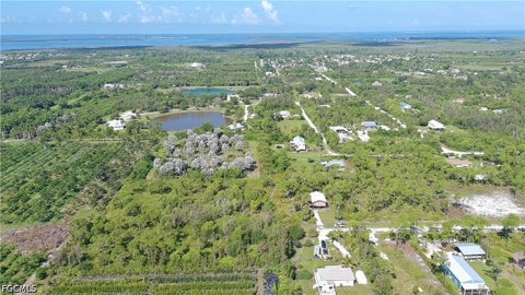 Tiny photo for 14999 Martinique Way, Bokeelia, FL 33922 (MLS # 2026039230)