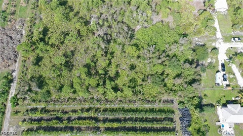Tiny photo for 14999 Martinique Way, Bokeelia, FL 33922 (MLS # 2026039230)