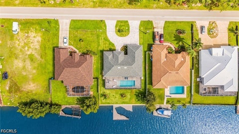 Tiny photo for 136 Kamal Parkway, Cape Coral, FL 33904 (MLS # 2026039772)