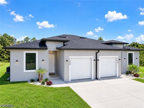 Tiny photo for 1258 MILWAUKEE Boulevard, Lehigh Acres, FL 33974 (MLS # 2026030201)