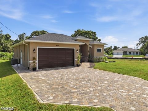 Tiny photo for 810 Sentinela Boulevard, Lehigh Acres, FL 33974 (MLS # 2026018818)