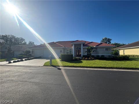 Photo of 9811 Ensign Court, Fort Myers, FL 33919 (MLS # 2026016846)
