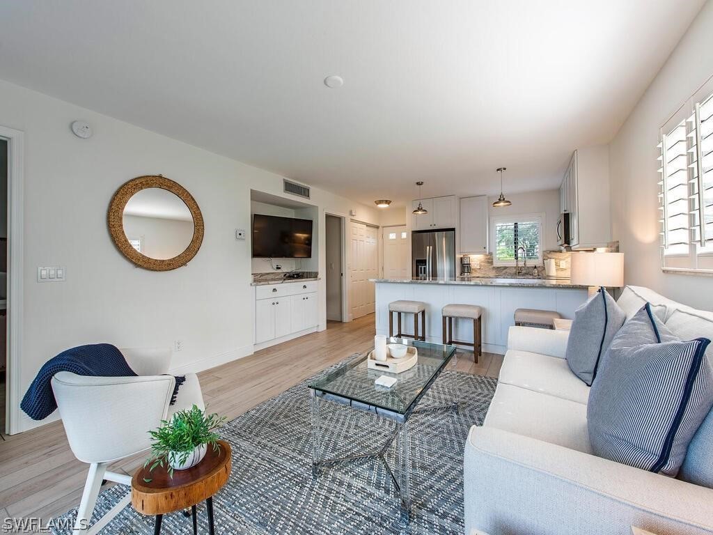 Living room featuring light wood-type flooring