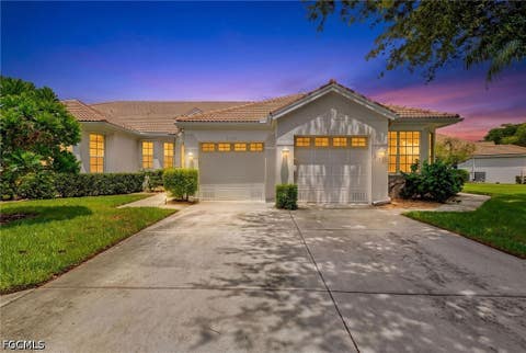 Photo of 8760 Stockbridge Drive, Fort Myers, FL 33908 (MLS # 2026035107)