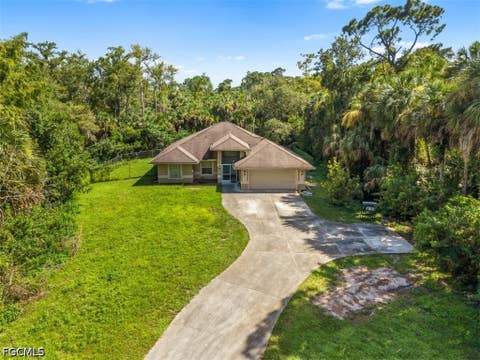 Photo of 710 16th Avenue NW, Naples, FL 34120 (MLS # 2026035204)