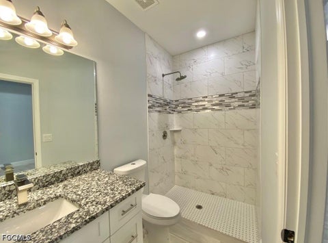 Tiny photo for 2403 Dickens Avenue N, Lehigh Acres, FL 33971 (MLS # 2026039394)