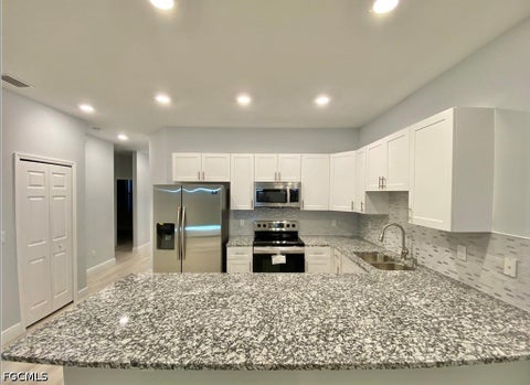 Tiny photo for 2403 Dickens Avenue N, Lehigh Acres, FL 33971 (MLS # 2026039394)
