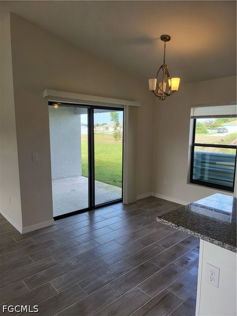Tiny photo for 1714 NE 10th Lane, Cape Coral, FL 33909 (MLS # 2026020126)