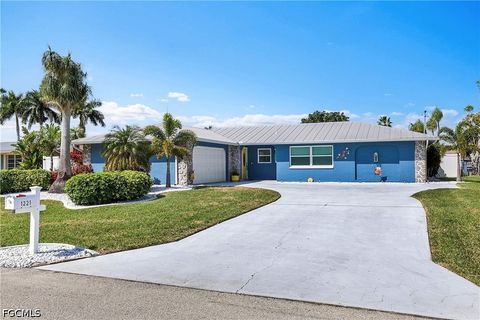Photo of 1221 SE 43rd Terrace, Cape Coral, FL 33904 (MLS # 2026020062)