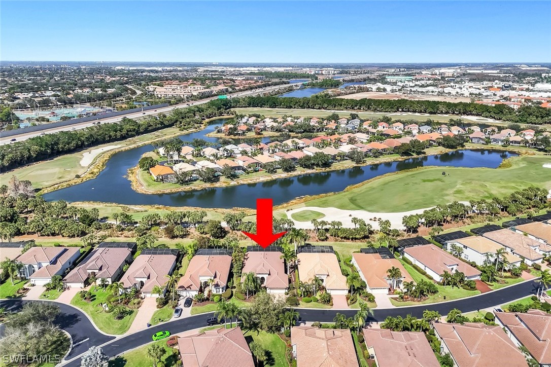 Aerial view of property and surrounding area with