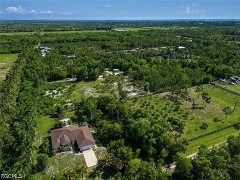 Photo of 6207 Hodges Drive, Bokeelia, FL 33922 (MLS # 2026031261)