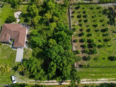 Tiny photo for 6207 Hodges Drive, Bokeelia, FL 33922 (MLS # 2026031261)