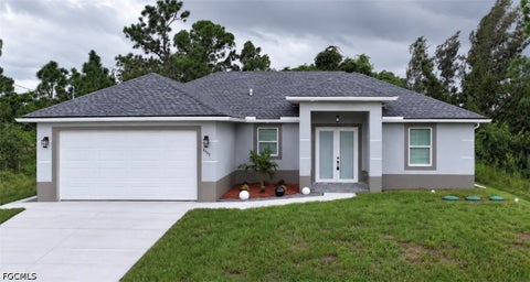 Photo of 3203 10th Street W, Lehigh Acres, FL 33971 (MLS # 2026037559)