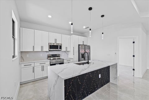 Tiny photo for 2129/2131 Fairway Drive, Lehigh Acres, FL 33973 (MLS # 2026027919)