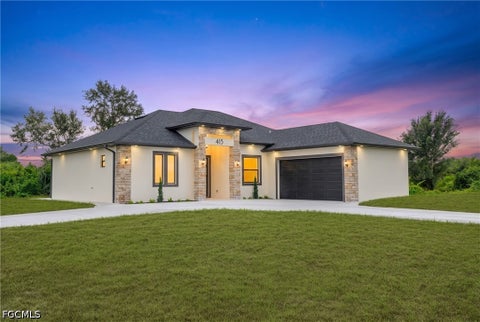 Photo of 415 Chamonix Avenue S, Lehigh Acres, FL 33974 (MLS # 2026041785)
