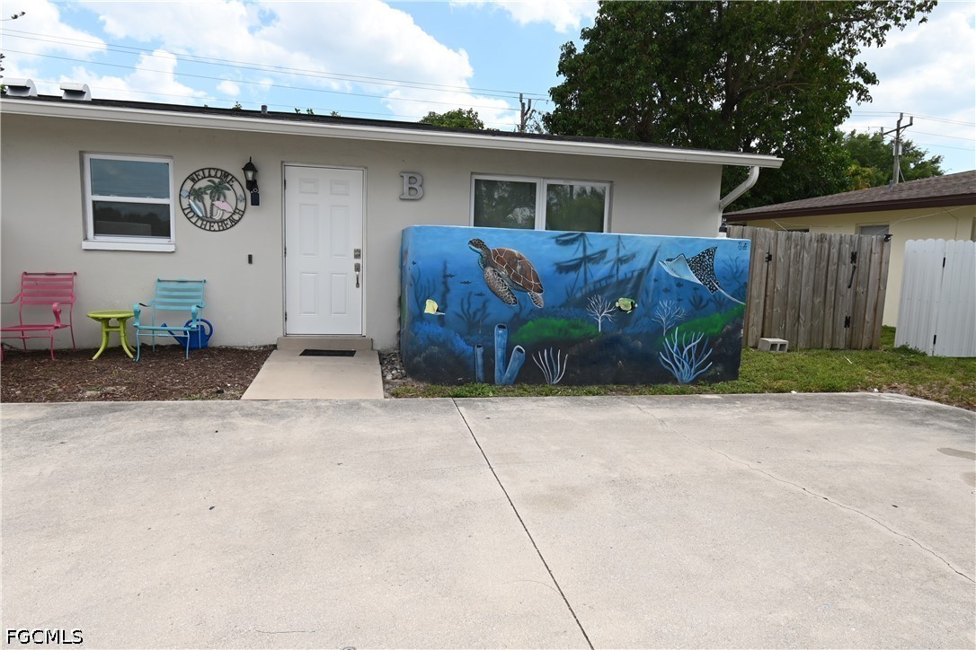 Exterior unit with a white front door, a prominent