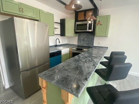 Tiny photo for 231 Santa Cruz Street, North Fort Myers, FL 33903 (MLS # 2026020120)