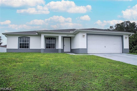 Photo of 2819 48th Street SW, Lehigh Acres, FL 33976 (MLS # 2026039862)