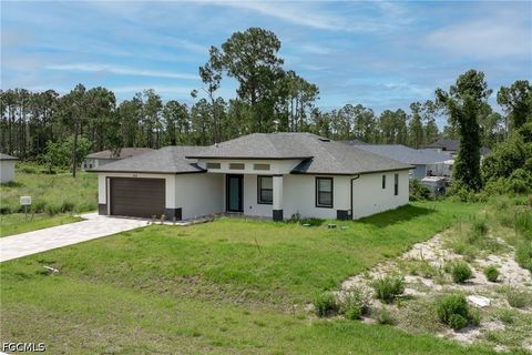 Photo of 928 Milwaukee Boulevard, Lehigh Acres, FL 33974 (MLS # 2026020153)