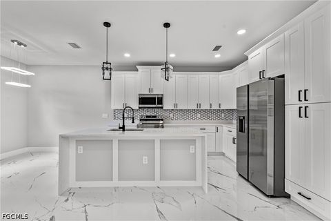 Tiny photo for 928 Milwaukee Boulevard, Lehigh Acres, FL 33974 (MLS # 2026020153)