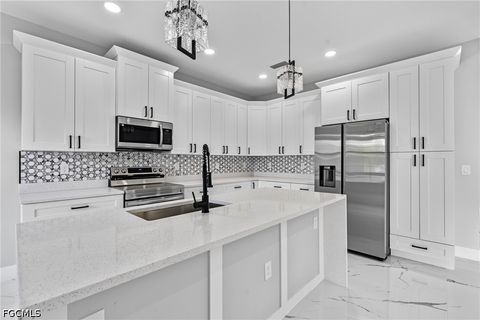 Tiny photo for 928 Milwaukee Boulevard, Lehigh Acres, FL 33974 (MLS # 2026020153)