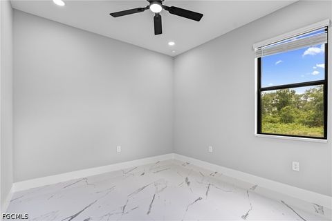 Tiny photo for 928 Milwaukee Boulevard, Lehigh Acres, FL 33974 (MLS # 2026020153)