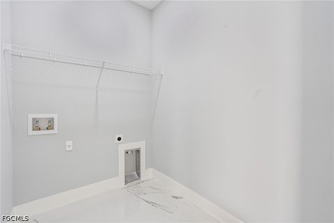 Tiny photo for 928 Milwaukee Boulevard, Lehigh Acres, FL 33974 (MLS # 2026020153)