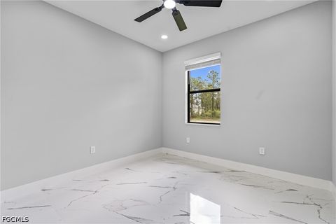 Tiny photo for 928 Milwaukee Boulevard, Lehigh Acres, FL 33974 (MLS # 2026020153)