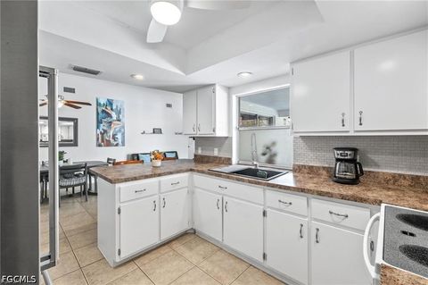 Tiny photo for 1015 SE 25th Lane, Cape Coral, FL 33904 (MLS # 2026020385)