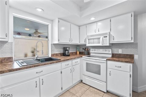 Tiny photo for 1015 SE 25th Lane, Cape Coral, FL 33904 (MLS # 2026020385)