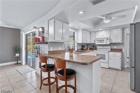 Tiny photo for 1015 SE 25th Lane, Cape Coral, FL 33904 (MLS # 2026020385)