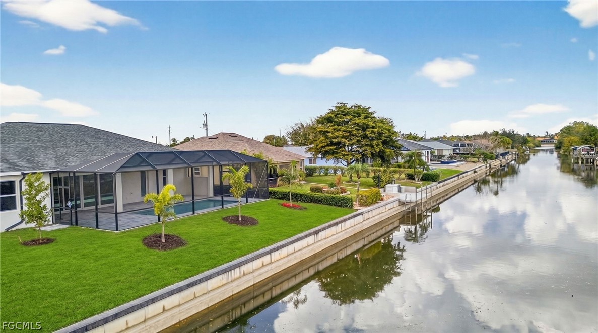 Photo 1 of 36 — 303 SE 1st Place, Cape Coral, FL 33990