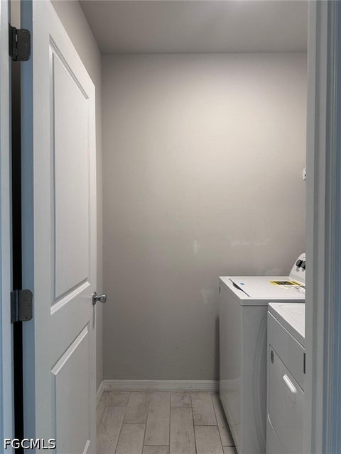 Tiny photo for 911 Unice Avenue N, Lehigh Acres, FL 33971 (MLS # 2026039643)