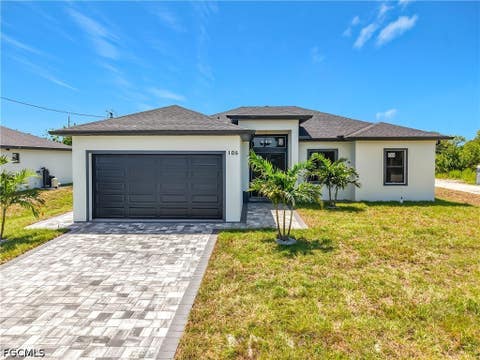 Photo of 105 Ruby Avenue N, Lehigh Acres, FL 33971 (MLS # 2026035324)