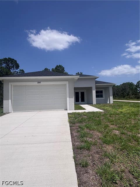 Photo of 500 Ladd Street, Lehigh Acres, FL 33974 (MLS # 2026034849)