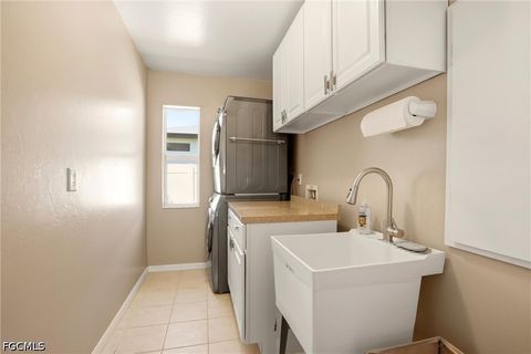 Tiny photo for 122 SE 29th Street, Cape Coral, FL 33904 (MLS # 2026018528)