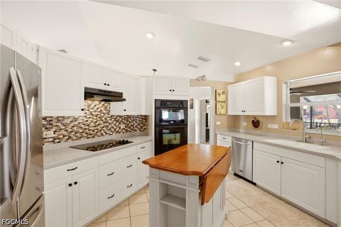 Tiny photo for 122 SE 29th Street, Cape Coral, FL 33904 (MLS # 2026018528)