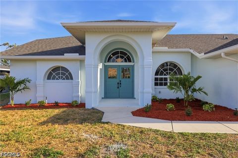 Photo of 627 SW 56th Street, Cape Coral, FL 33914 (MLS # 2026014516)