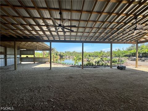 Tiny photo for 12242 Eagles Nest Drive, Bokeelia, FL 33922 (MLS # 2026020078)
