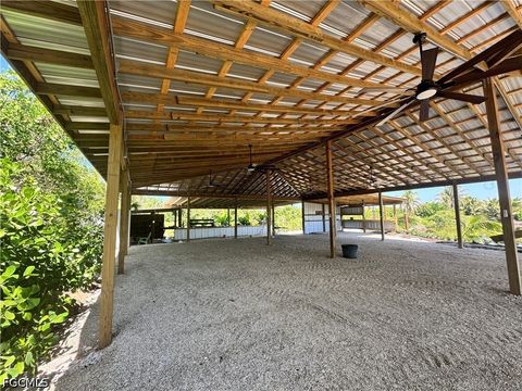 Tiny photo for 12242 Eagles Nest Drive, Bokeelia, FL 33922 (MLS # 2026020078)