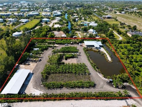 Photo of 12242 Eagles Nest Drive, Bokeelia, FL 33922 (MLS # 2026020078)