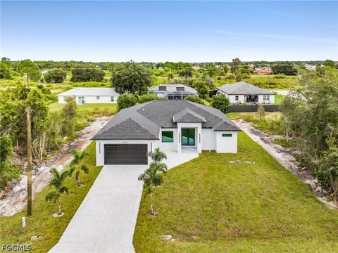 Photo of 3002 58th Street W, Lehigh Acres, FL 33971 (MLS # 2026041673)