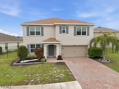 Photo of 10601 Crossback Lane, Lehigh Acres, FL 33936 (MLS # 2026038102)