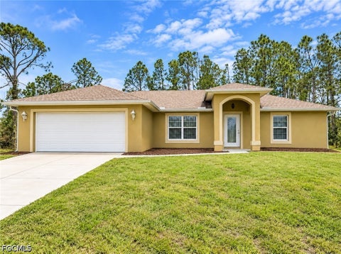 Photo of 1023 Maddock Street E, Lehigh Acres, FL 33974 (MLS # 2026041537)